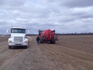 Biosolids from St. Cloud being transferred to a field applicator