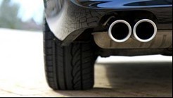 Car bumper with dual tailpipes 