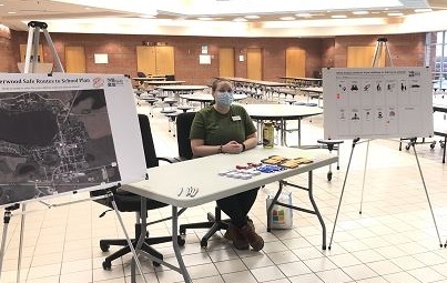 member tabling at a school