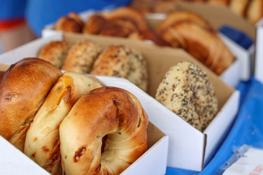 Close up photo of  boxes of bagels.