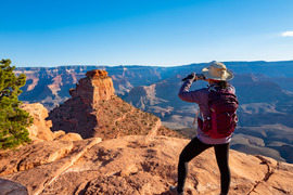 Person looking out over the Grand Canyon
