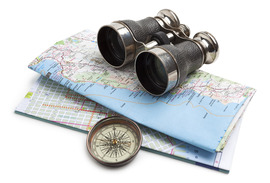 Travel binoculars, map and compass