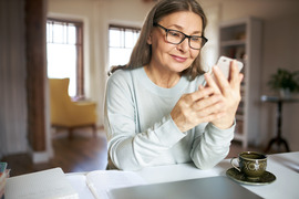 Woman using cell phone technology