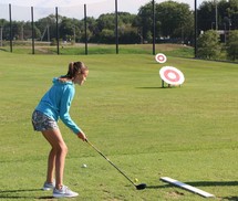 girl golfing