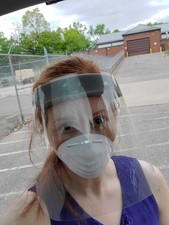 Commissioner Frethem in face mask and shield at Armory testing site on May 24