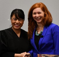 Commissioner Nicole Frethem and Judge Sophia Vuelo at Nicole's swearing in ceremony in 2019.