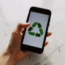 Cell phone showing a recycle symbol