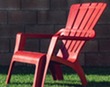 Red plastic lawn chair