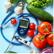 diabetes meter and vegetables