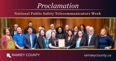 Commissioner McGuire poses with staff for National Public Safety Communicators Week