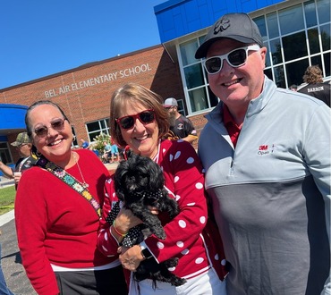 Commissioner McGuire with the Megan family and dog