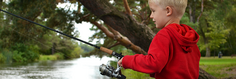 boy fishing in Battle Creek