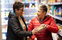Two women grocery shopping