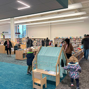 Kids and adults in a library