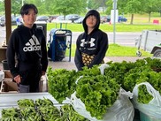 Xia's Fresh Cut Flowers & Vegetables Booth