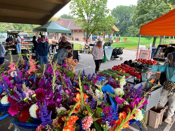 Market scene with flowers and veggies