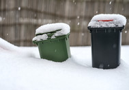 snowy garbage cans