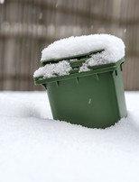 snowy garbage cans