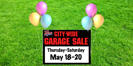 City Wide Garage Sale with balloons and grass