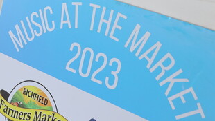 Music at the market sign