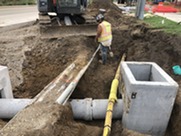 Construction worker working on Second Street on utilities