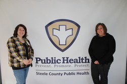 SCPH Social Workers in front of SCPH sign