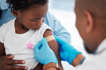Child receiving an immunization