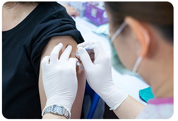 Person getting vaccination shot