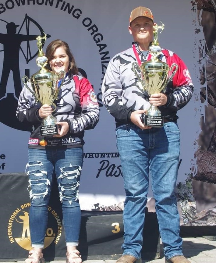 Ivy Walton and Jeremiah Jones with their NASP/IBO Outdoor World 3D Challenge trophies.