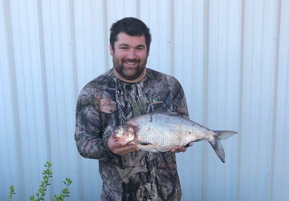 Joseph Duncan shows off his state record gizzard shad