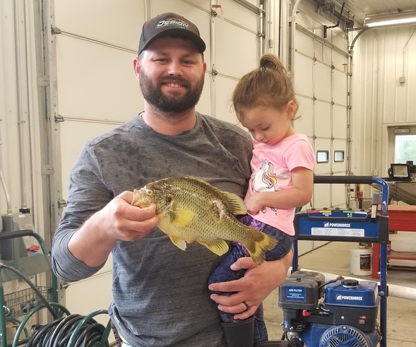 Alex Phillips holds new record redear sunfish