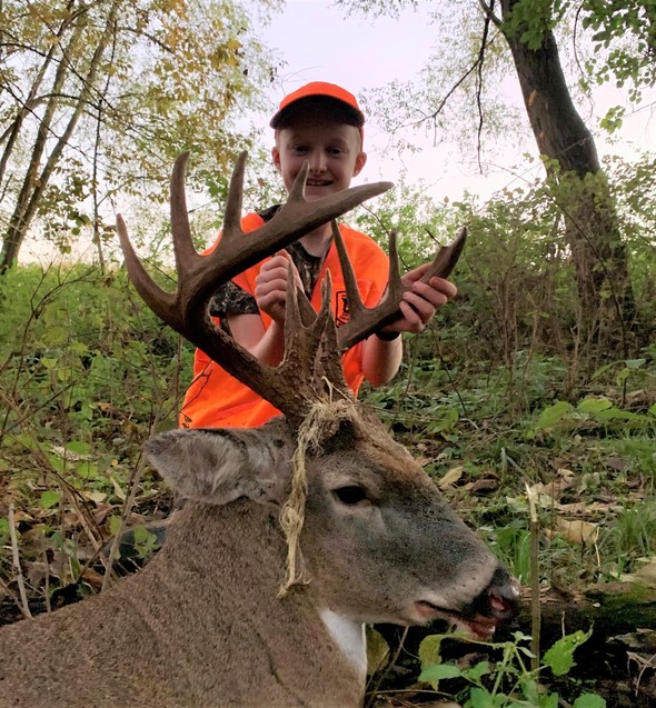 Lucas Gruber with buck harvested in Howell County.