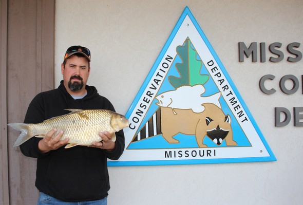 Josh Lawmaster with state record quillback