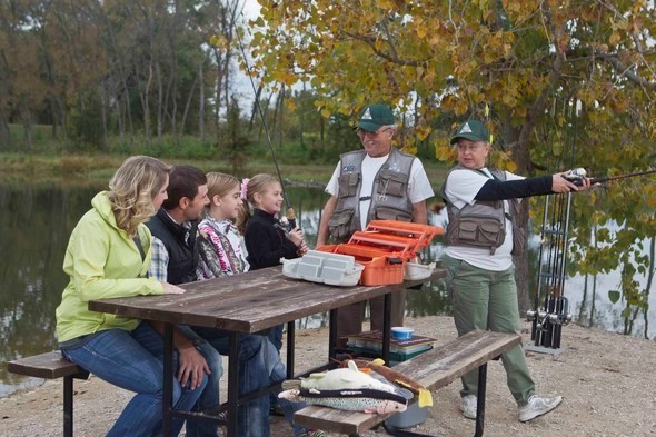 MDC volunteers help family to fish