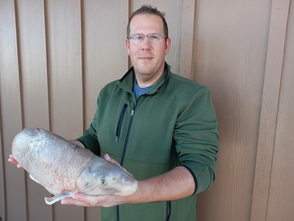 Travis Uebinger holds state record blue sucker