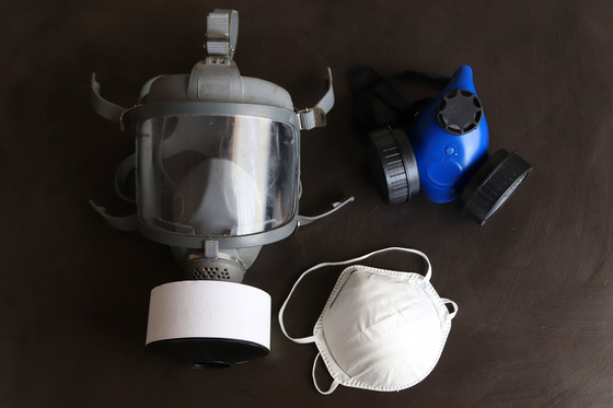 Three common respirators/masks displayed.