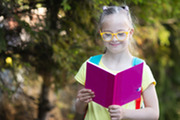 Girl reading outside