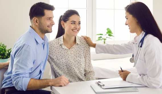 Photo of Couple with Doctor