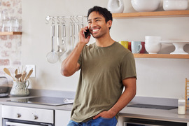 Person Laughing While on the Phone