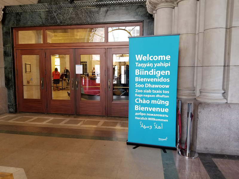 Welcoming sign in entrance to City Hall in 12 languages taken for World Refugee Day on 6/20/2019