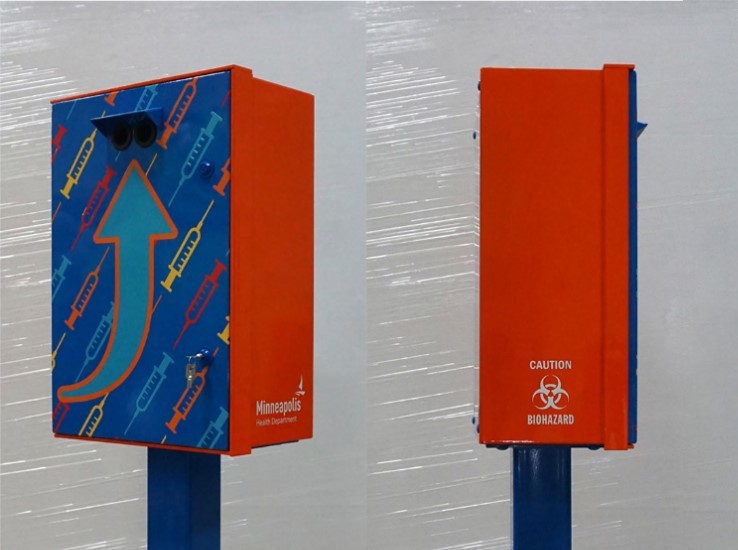 syringe box photo, blue box, blue pole with red painted siding