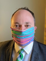 Council Member Fletcher wearing a cloth mask