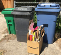 Recycling bins with cardboard boxes