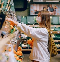 Person with face mask on while inside a grocery store