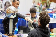 Kids visiting the Bakken Museum exhibit at the 2018 Community Connections Conference