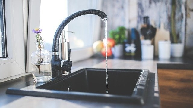 Drinking water flowing from a tap