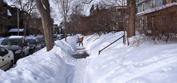 Shoveled sidewalk clear of snow