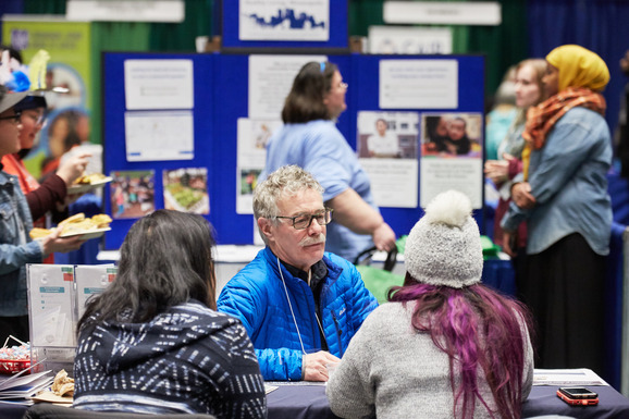 Exhibitor in conversation at 2018 Community Connections Conference