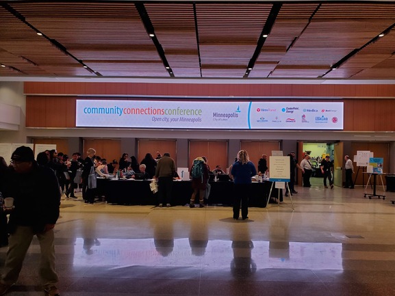 2024 Community Connections Conference registration table crowd shot
