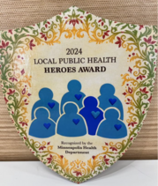 award given to awardees at the public health heroes event
